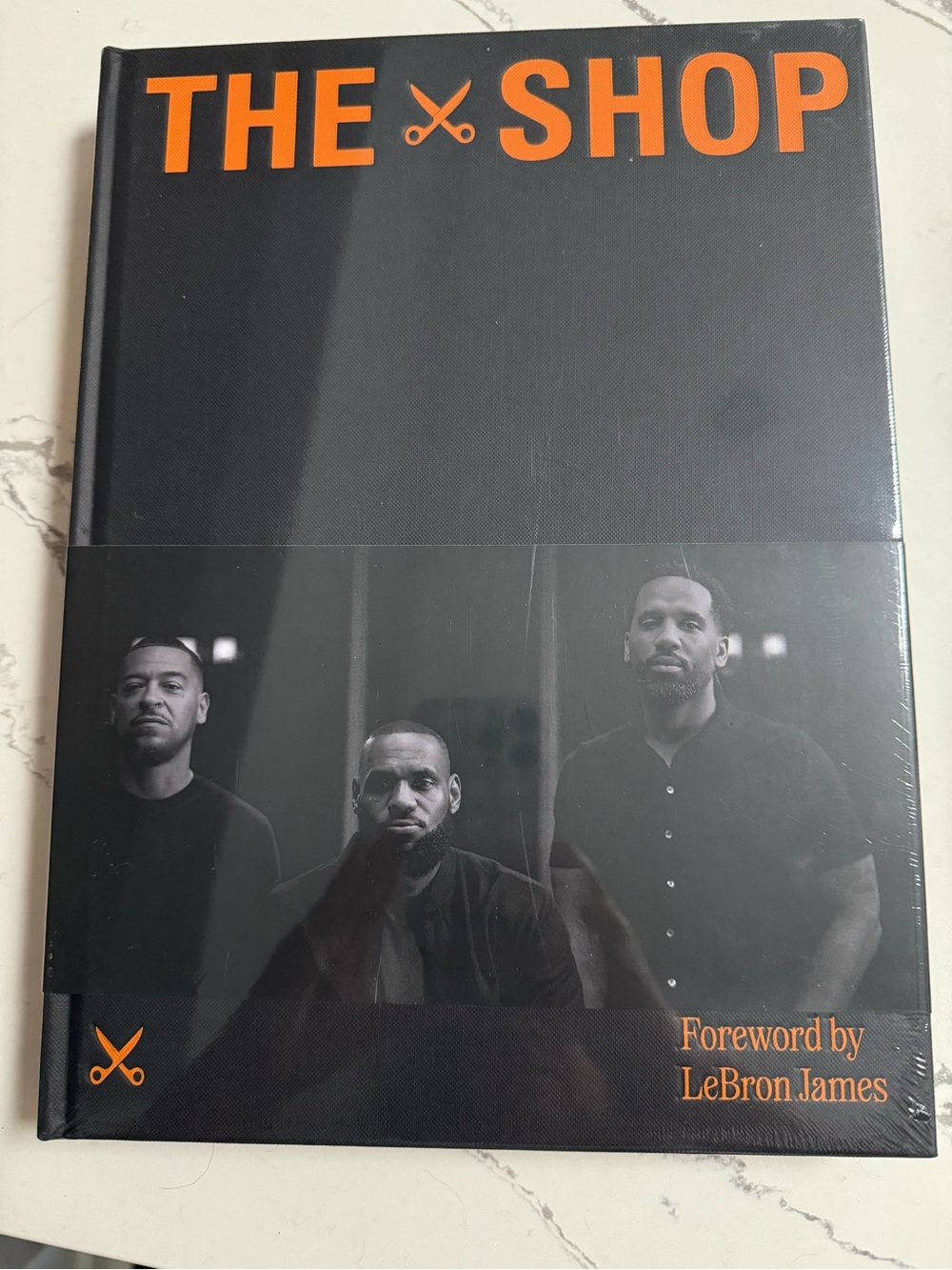 The Shop Men's Grooming Book - Black with Orange Text